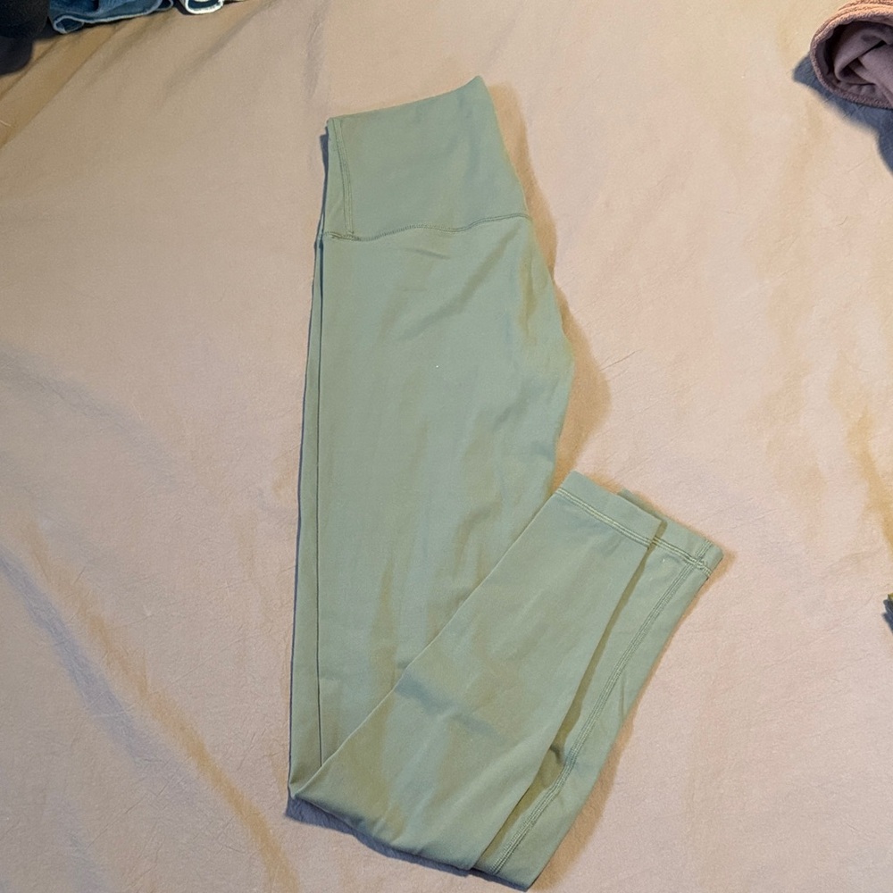 Green leggings